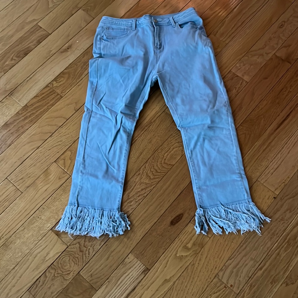 Ankle shredded jeans size 14.